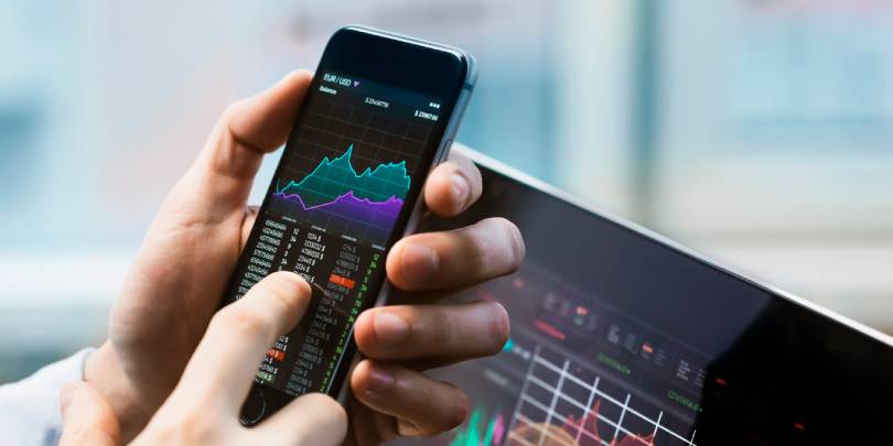 NASDAQ закрылся в плюсе благодаря ралли в пятницу